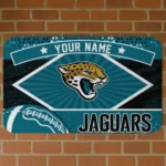 custom-jacksonville-jaguars-football-crest-teal-black-doormat-best-selling.webp