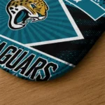 custom-jacksonville-jaguars-football-crest-teal-black-doormat-best-selling.webp