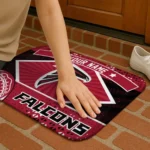 customized-atlanta-falcons-football-crest-red-black-doormat-best-selling.webp