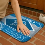 customized-detroit-lions-football-crest-blue-black-doormat-best-selling.webp