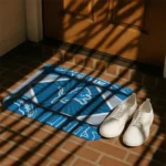 customized-detroit-lions-football-crest-blue-black-doormat-best-selling.webp
