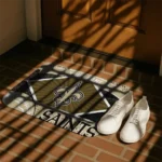 customized-new-orleans-saints-football-crest-gold-black-doormat-best-selling.webp