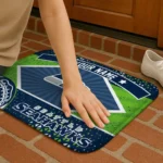 customized-seattle-seahawks-football-crest-blue-black-doormat-best-selling.webp