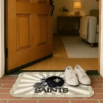 new-orleans-saints-helmet-centerpiece-gold-doormat-best-selling.webp