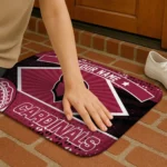 personalized-arizona-cardinals-football-crest-red-black-doormat-best-selling.webp