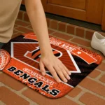 personalized-cincinnati-bengals-football-crest-orange-black-doormat-best-selling.webp