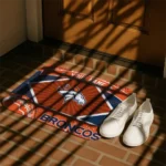 personalized-denver-broncos-football-crest-orange-black-doormat-best-selling.webp