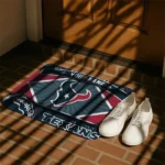 personalized-houston-texans-football-crest-blue-black-doormat-best-selling.webp
