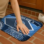 personalized-tennessee-titans-football-crest-navy-black-doormat-best-selling.webp