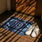 personalized-tennessee-titans-football-crest-navy-black-doormat-best-selling.webp