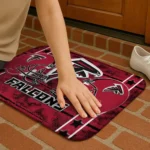 atlanta-falcons-helmet-illustration-red-doormat-best-selling.webp