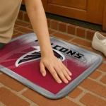 atlanta-falcons-pixel-blur-red-doormat-best-selling.webp