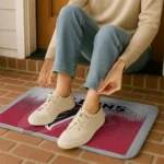 atlanta-falcons-pixel-blur-red-doormat-best-selling.webp