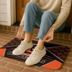 cincinnati-bengals-techno-camo-orange-black-doormat-best-selling.webp