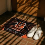 cincinnati-bengals-techno-camo-orange-black-doormat-best-selling.webp