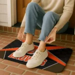 cleveland-browns-techno-camo-brown-black-doormat-best-selling.webp