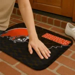 cleveland-browns-tribal-detailing-brown-black-doormat-best-selling.webp