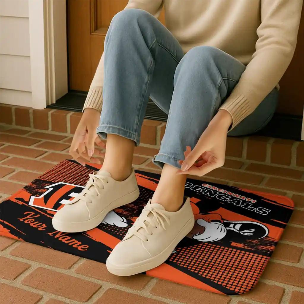 customized-cincinnati-bengals-mickey-quarterback-orange-black-doormat-top-rated.webp
