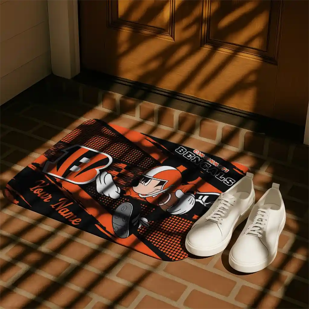 customized-cincinnati-bengals-mickey-quarterback-orange-black-doormat-trendy.webp