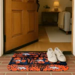 denver-broncos-palm-silhouette-orange-black-doormat-best-selling.webp