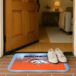 denver-broncos-pixel-blur-orange-doormat-best-selling.webp