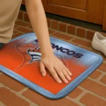 denver-broncos-pixel-blur-orange-doormat-best-selling.webp