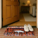 denver-broncos-vertical-flow-orange-doormat-best-selling.webp