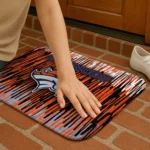 denver-broncos-vertical-flow-orange-doormat-best-selling.webp