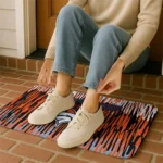 denver-broncos-vertical-flow-orange-doormat-best-selling.webp