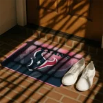 houston-texans-pixel-blur-blue-doormat-best-selling.webp