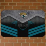 jacksonville-jaguars-chevron-points-teal-black-doormat-best-selling.webp