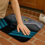 jacksonville-jaguars-chevron-points-teal-black-doormat-best-selling.webp