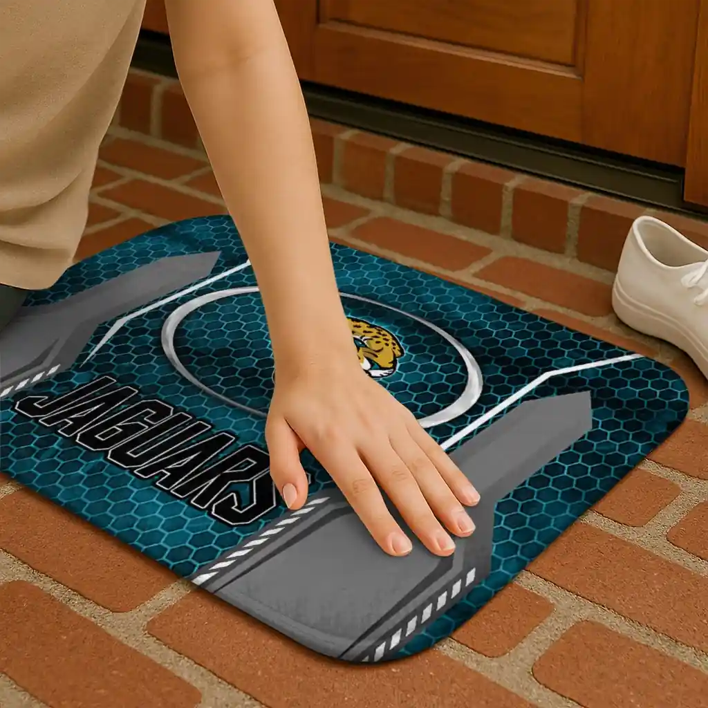jacksonville-jaguars-hexagon-oval-teal-doormat-premium-grade.webp