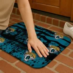 jacksonville-jaguars-palm-silhouette-teal-black-doormat-best-selling.webp