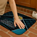 jacksonville-jaguars-techno-camo-teal-black-doormat-best-selling.webp