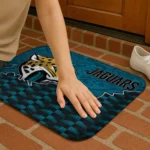 jacksonville-jaguars-tribal-detailing-teal-black-doormat-best-selling.webp