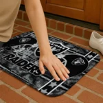 las-vegas-raiders-helmet-illustration-black-doormat-best-selling.webp