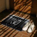 las-vegas-raiders-pixel-blur-black-doormat-best-selling.webp