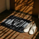 las-vegas-raiders-plate-rip-black-doormat-best-selling.webp