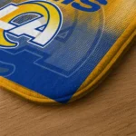 los-angeles-rams-pixel-blur-blue-doormat-best-selling.webp