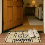 new-orleans-saints-bolt-row-gold-doormat-best-selling.webp