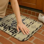 new-orleans-saints-bolt-row-gold-doormat-best-selling.webp