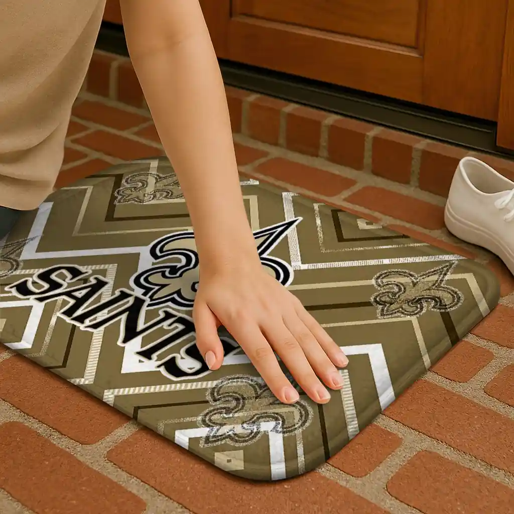 new-orleans-saints-chevron-geometrics-gold-doormat-premium-grade.webp