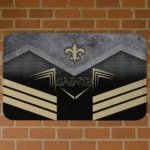 new-orleans-saints-chevron-points-gold-black-doormat-best-selling.webp