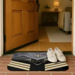 new-orleans-saints-chevron-points-gold-black-doormat-best-selling.webp