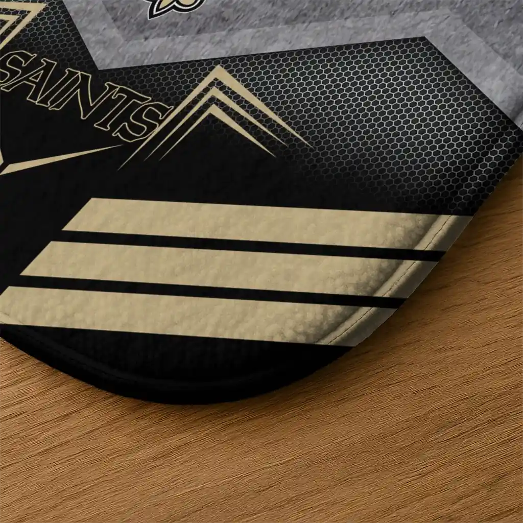 new-orleans-saints-chevron-points-gold-black-doormat-latest-model.webp