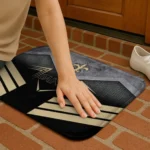 new-orleans-saints-chevron-points-gold-black-doormat-best-selling.webp