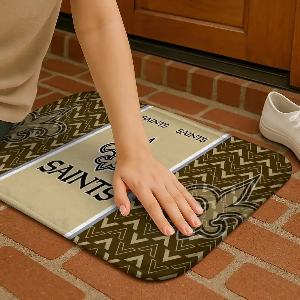 new-orleans-saints-chevron-stack-gold-doormat-premium-grade.webp