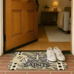 new-orleans-saints-helmet-illustration-gold-doormat-best-selling.webp