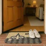 new-orleans-saints-tribal-detailing-gold-black-doormat-best-selling.webp